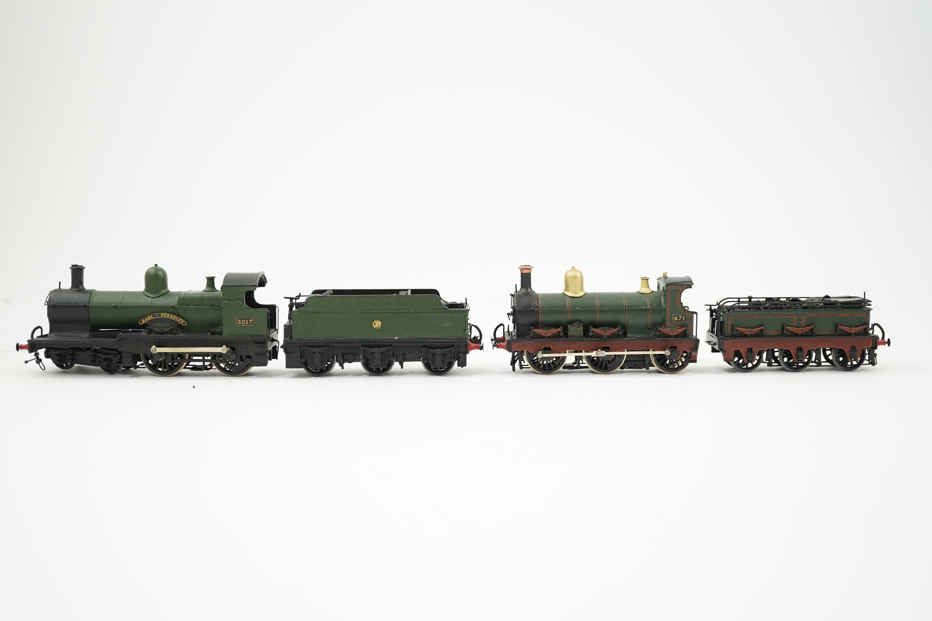 Two 00 gauge brass and white metal kit built GWR tender locomotives; an Armstrong 0-6-0, 671, together with an Earl class 4-4-0, Earl of Berkeley 3217, constructed, painted and lined to a high standard, both motored for